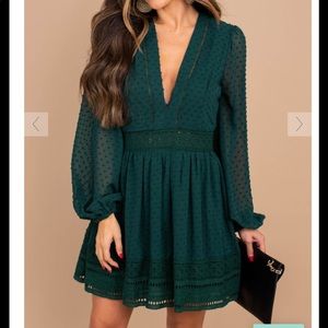 Long sleeved dress with plunging neckline